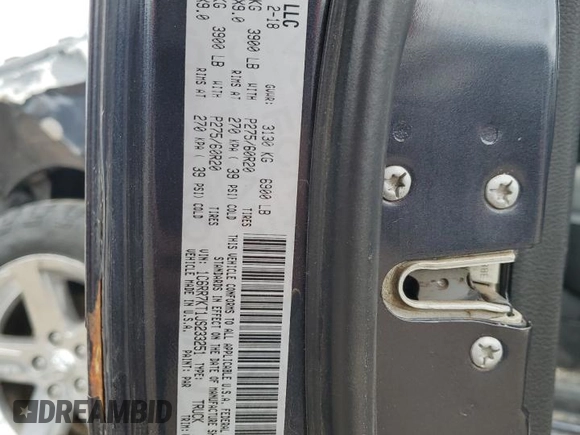 2018 Ram 1500 Tradesman with VIN 1C6RR7KT1JS233251, listed as a Copart auction lot 49732415 with 167,744 mi miles and Salvage title. Bid and sale history available at DreamBid. Image 12.