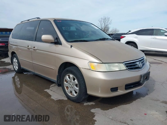 2002 Honda Odyssey EX-L z VIN 2HKRL18042H567858, wystawiony jako IAAI lot #41686147 z przebiegiem 264 570 mil mil oraz . Historia ofert i sprzedaży dostępna na DreamBid. Obrazek 1.
