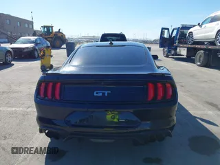 2021 Ford Mustang GT z VIN 1FA6P8CF6M5149175, wystawiony jako IAAI lot #41798328 z przebiegiem 61 776 mil mil oraz . Historia ofert i sprzedaży dostępna na DreamBid. Obrazek 16.