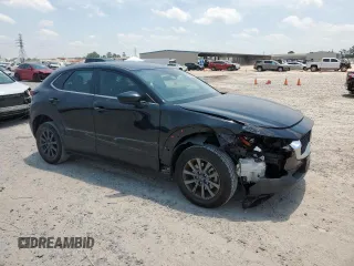 2021 Mazda CX-30 S with VIN 3MVDMAAL9MM273086, listed as a Copart auction lot 57276845 with 79,432 mi miles and Salvage title. Bid and sale history available at DreamBid. Image 4.