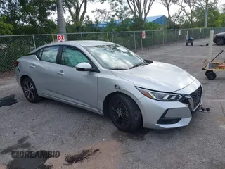 2022 Nissan Sentra SV z VIN 3N1AB8CV7NY315866, wystawiony jako IAAI lot #42303501 z przebiegiem 34 197 mil mil oraz . Historia ofert i sprzedaży dostępna na DreamBid. Obrazek 1.