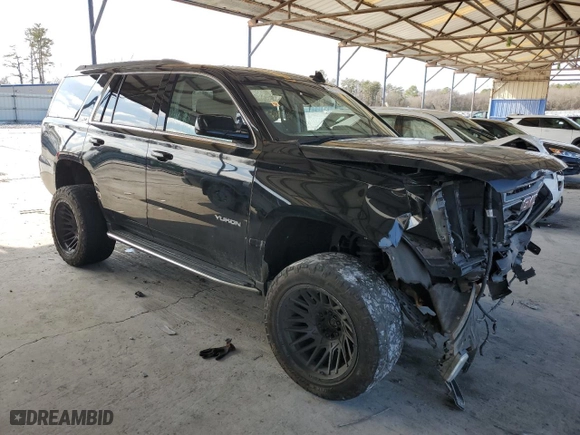 2019 GMC Yukon SLT with VIN 1GKS2BKCXKR108358, listed as a Copart auction lot 44719115 with 127,724 mi miles and Salvage Title. Bid and sale history available at carsss.com. Image 4.