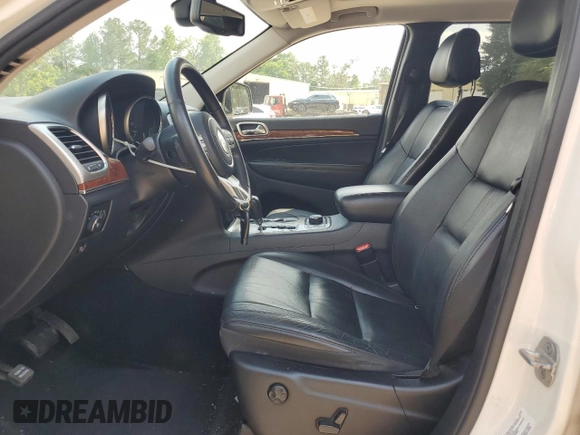 2012 Jeep Grand Cherokee Limited z VIN 1C4RJFBT0CC287342, wystawiony jako Copart lot #57000525 z przebiegiem 135 655 mil mil oraz Szkoda całkowita • Salvage title. Historia ofert i sprzedaży dostępna na DreamBid. Obrazek 7.