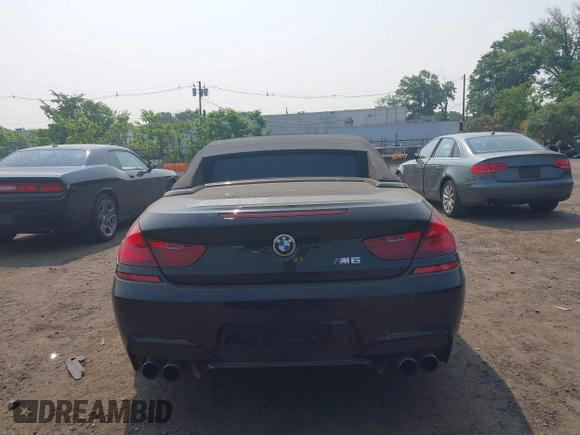 2014 BMW M6 z VIN WBSLZ9C5XEDZ78402, wystawiony jako IAAI lot #42399055 z przebiegiem 127 803 mil mil oraz . Historia ofert i sprzedaży dostępna na DreamBid. Obrazek 16.