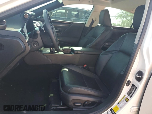 2020 Lexus ES 300h with VIN 58AD21B10LU007586, listed as a Copart auction lot 60130325 with 68,851 mi miles and Salvage title. Bid and sale history available at DreamBid. Image 7.