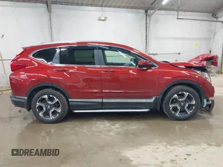 2017 Honda CR-V Touring with VIN 2HKRW2H95HH610401, listed as a IAAI auction lot 42177024 with 42,494 mi miles and . Bid and sale history available at carsss.com. Image 13.