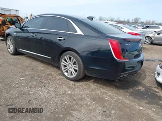 2018 Cadillac XTS Luxury with VIN 2G61M5S30J9145353, listed as a IAAI auction lot 41859404 with 137,874 mi miles. Bid and sale history available at carsss.com. Image 3.