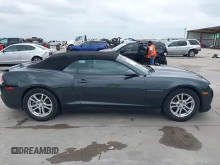 2015 Chevrolet Camaro LT z VIN 2G1FD3D36F9135883, wystawiony jako IAAI lot #42140687 z przebiegiem 135 897 mil mil oraz . Historia ofert i sprzedaży dostępna na DreamBid. Obrazek 13.