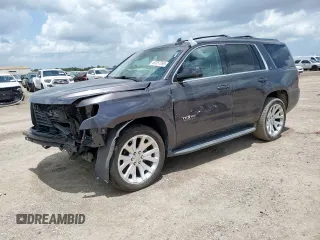 2018 Chevrolet Tahoe LT with VIN 1GNSCBKC8JR135511, listed as a Copart auction lot 60357095 with 123,904 mi miles and Salvage title. Bid and sale history available at DreamBid. Image 1.