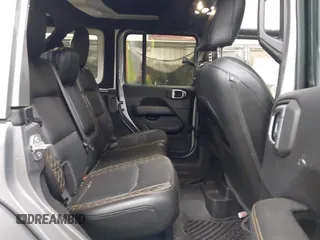 2021 Jeep Wrangler Unlimited Sahara with VIN 1C4HJXEN1MW529568, listed as a IAAI auction lot 42336590 with 39,931 mi miles and . Bid and sale history available at DreamBid. Image 8.