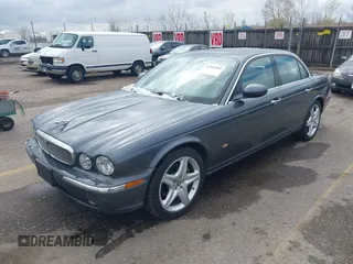 2006 Jaguar XJ with VIN SAJWA71B16SG50490, listed as a IAAI auction lot 41964002 with 114,270 mi miles. Bid and sale history available at carsss.com. Image 2.