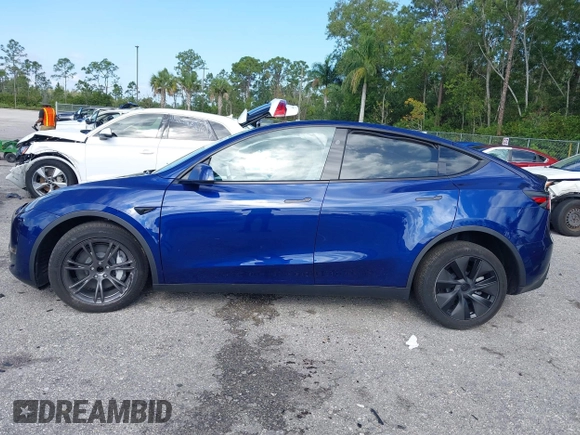 2025 Tesla Model Y Long Range z VIN 7SAYGDED0SF256650, wystawiony jako IAAI lot #41993206 z przebiegiem Nie podano mil oraz . Historia ofert i sprzedaży dostępna na DreamBid. Obrazek 14.