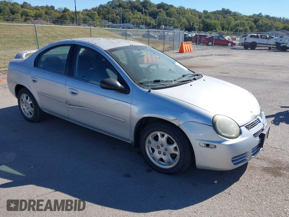 2003 Dodge Neon SXT with VIN 1B3ES56C43D215636, listed as a IAAI auction lot 40627629 with 121,237 mi miles. Bid and sale history available at carsss.com. Image 1.