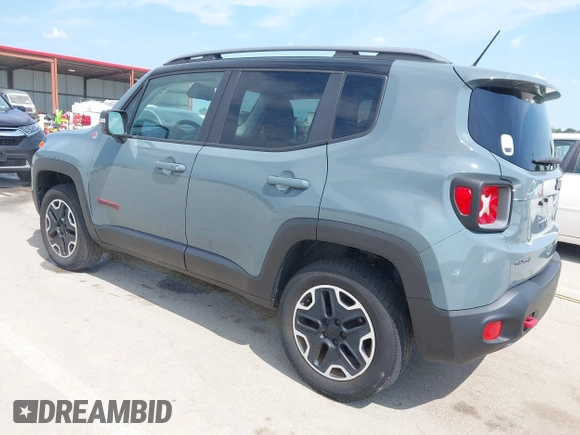 2015 Jeep Renegade Trailhawk with VIN ZACCJBCT8FPB33586, listed as a IAAI auction lot 42590207 with 127,168 mi miles and . Bid and sale history available at DreamBid. Image 3.