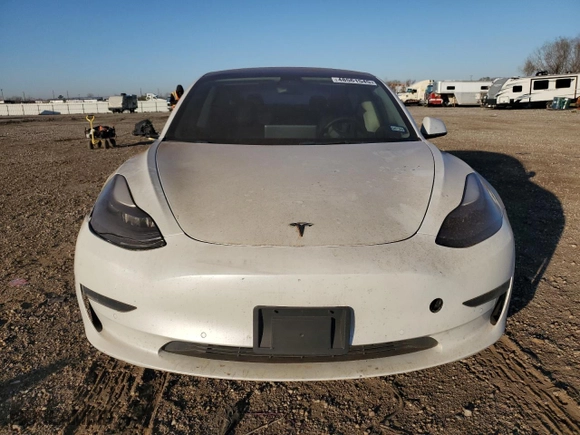 2021 Tesla Model 3 Standard Range Plus with VIN 5YJ3E1EA9MF100403, listed as a Copart auction lot 48561545 with 68,996 mi miles and Salvage Title. Bid and sale history available at carsss.com. Image 5.