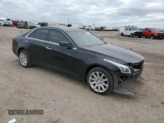 2014 Cadillac CTS Luxury RWD z VIN 1G6AR5SXXE0172077, wystawiony jako Copart lot #52762905 z przebiegiem Nie podano mil oraz Szkody całkowita. Historia ofert i sprzedaży dostępna na DreamBid. Obrazek 4.
