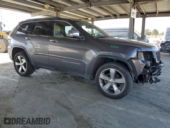 2014 Jeep Grand Cherokee Limited with VIN 1C4RJFBG7EC588986, listed as a Copart auction lot 52284405 with 92,702 mi miles and Salvage Title. Bid and sale history available at DreamBid. Image 4.