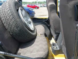 2004 Jeep Wrangler Sport z VIN 1J4FA49S04P701986, wystawiony jako IAAI lot #42256648 z przebiegiem 129 946 mil mil oraz . Historia ofert i sprzedaży dostępna na DreamBid. Obrazek 8.
