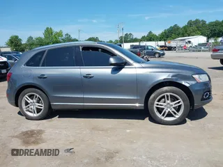 2016 Audi Q5 Premium Plus z VIN WA1L2AFP9GA009523, wystawiony jako IAAI lot #42536651 z przebiegiem 136 812 mil mil oraz . Historia ofert i sprzedaży dostępna na DreamBid. Obrazek 13.