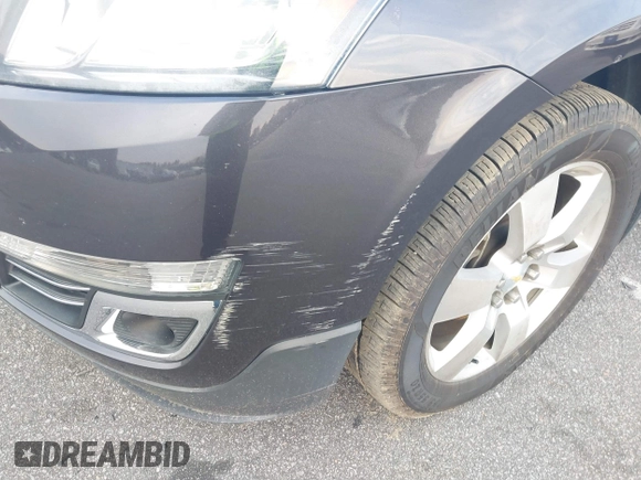 2015 Chevrolet Traverse LTZ with VIN 1GNKVJKDXFJ206159, listed as a IAAI auction lot 41762515 with 143,062 mi miles and . Bid and sale history available at DreamBid. Image 17.