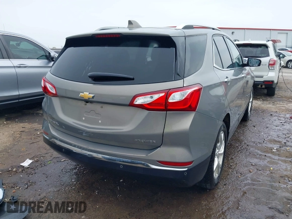 2019 Chevrolet Equinox Premier z VIN 3GNAXNEVXKS503474, wystawiony jako IAAI lot #42084263 z przebiegiem 93 838 mil mil oraz . Historia ofert i sprzedaży dostępna na DreamBid. Obrazek 4.