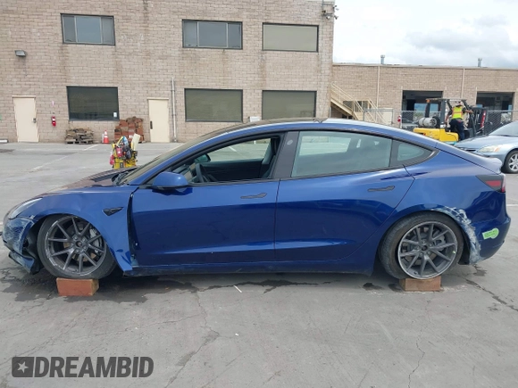 2021 Tesla Model 3 Long Range with VIN 5YJ3E1EB6MF878411, listed as a IAAI auction lot 41986947 with 71,978 mi miles and . Bid and sale history available at DreamBid. Image 15.