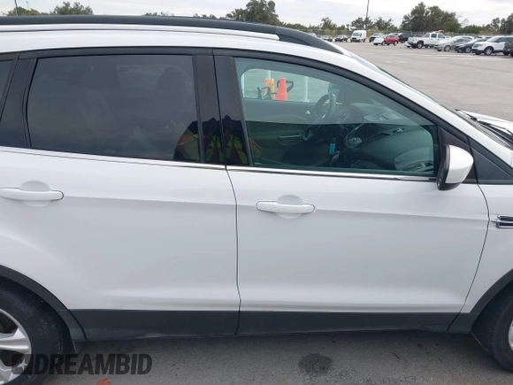 2015 Ford Escape SE with VIN 1FMCU0GX2FUB33893, listed as a IAAI auction lot 41455605 with 128,383 mi miles. Bid and sale history available at carsss.com. Image 13.
