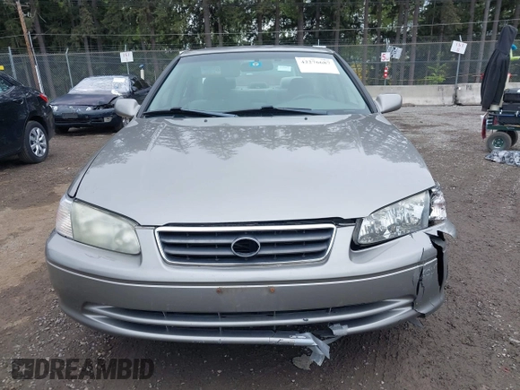 2001 Toyota Camry CE z VIN 4T1BG22K31U097733, wystawiony jako IAAI lot #42276687 z przebiegiem 180 357 mil mil oraz . Historia ofert i sprzedaży dostępna na DreamBid. Obrazek 12.