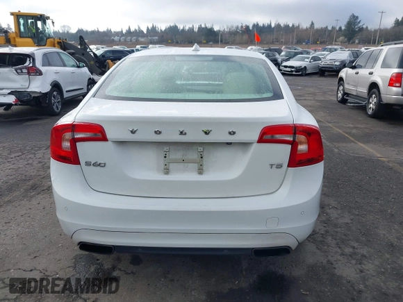 2015 Volvo S60 T5 Drive-E Premier with VIN YV126MFK4F2349564, listed as a IAAI auction lot 41711836 with 59,897 mi miles. Bid and sale history available at carsss.com. Image 16.