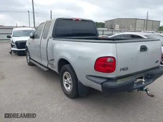 2003 Ford F-150 XL with VIN 1FTRX07253KB95404, listed as a IAAI auction lot 41945734 with 1 mi miles. Bid and sale history available at carsss.com. Image 3.