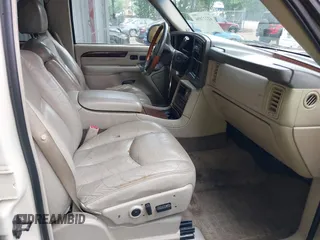 2003 Cadillac Escalade z VIN 1GYEK63NX3R241388, wystawiony jako IAAI lot #42227896 z przebiegiem 154 415 mil mil oraz . Historia ofert i sprzedaży dostępna na DreamBid. Obrazek 5.