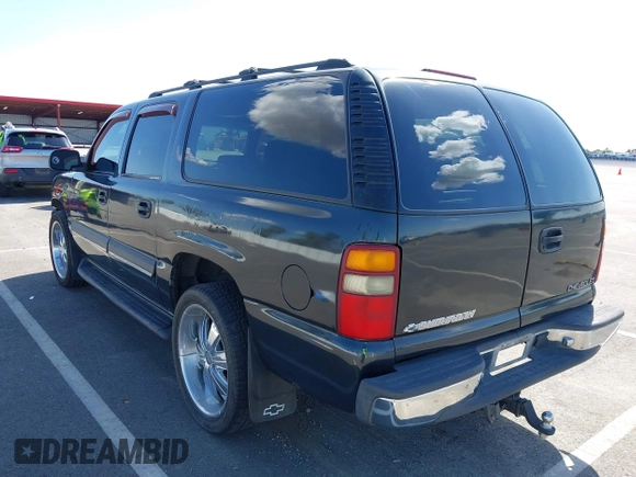 2003 Chevrolet Suburban LS with VIN 3GNEC16T63G115908, listed as a IAAI auction lot 41950165 with 202,075 mi miles. Bid and sale history available at carsss.com. Image 3.