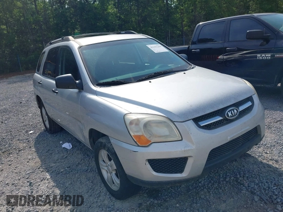 2009 Kia Sportage LX with VIN KNDJF724097567972, listed as a IAAI auction lot 42101204 with 221,299 mi miles. Bid and sale history available at carsss.com. Image 1.
