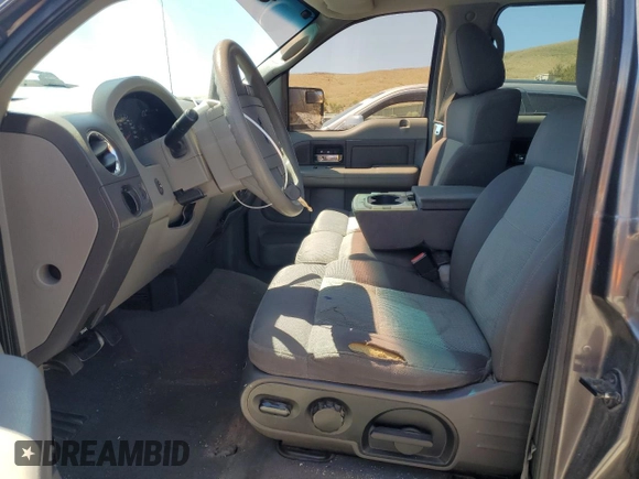 2004 Ford F-150 XLT с VIN 1FTPW14514KC82121, выставлен на аукционе Copart как лот 62336955 с пробегом 210 541 миль миль и Списание • Salvage title. История ставок и продаж доступна на DreamBid. Изображение 7.