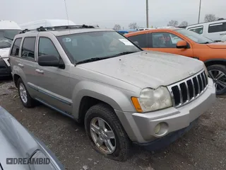 2007 Jeep Grand Cherokee Laredo with VIN 1J8GR48K17C537088, listed as a IAAI auction lot 41845987 with 143,661 mi miles. Bid and sale history available at carsss.com. Image 1.