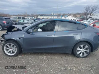 2023 Tesla Model Y Long Range with VIN 7SAYGDEE6PF824173, listed as a IAAI auction lot 41728613 with Not Provided miles and . Bid and sale history available at DreamBid. Image 14.