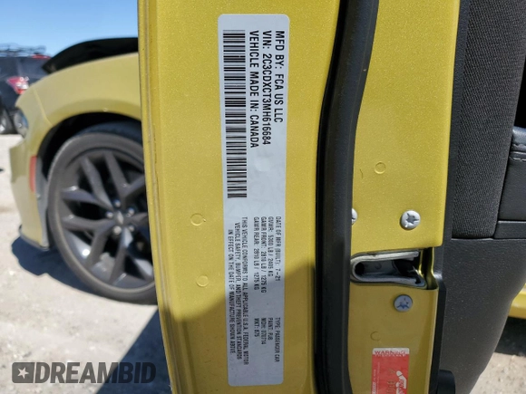 2021 Dodge Charger R/T with VIN 2C3CDXCT3MH616684, listed as a Copart auction lot 49876155 with 93,608 mi miles and Salvage Title. Bid and sale history available at carsss.com. Image 12.