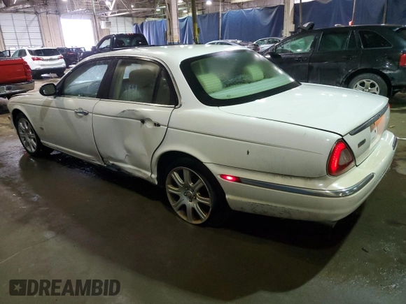 2006 Jaguar XJ with VIN SAJWA71B26SG50496, listed as a Copart auction lot 84859414 with 179,314 mi miles and Clean Title. Bid and sale history available at carsss.com. Image 2.