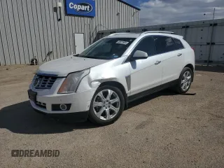 2014 Cadillac SRX Premium Collection z VIN 3GYFNGE32ES573872, wystawiony jako Copart lot #49871955 z przebiegiem 119 362 mil mil oraz Szkody całkowita. Historia ofert i sprzedaży dostępna na DreamBid. Obrazek 1.