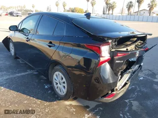 2019 Toyota Prius L Eco with VIN JTDKARFU9K3090948, listed as a IAAI auction lot 41400008 with 113,323 mi miles. Bid and sale history available at carsss.com. Image 3.