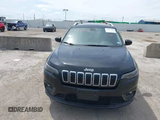 2019 Jeep Cherokee Latitude with VIN 1C4PJLCBXKD284954, listed as a IAAI auction lot 41877944 with 134,931 mi miles. Bid and sale history available at carsss.com. Image 6.