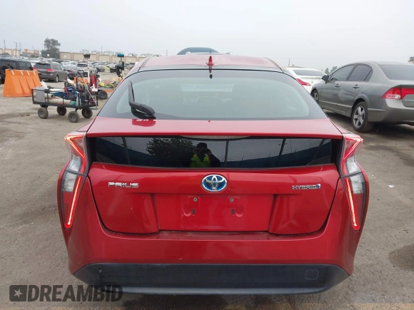 2016 Toyota Prius Two z VIN JTDKBRFU4G3531941, wystawiony jako IAAI lot #42023633 z przebiegiem 249 098 mil mil oraz . Historia ofert i sprzedaży dostępna na DreamBid. Obrazek 16.