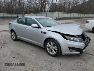 2013 Kia Optima EX z VIN 5XXGN4A7XDG144632, wystawiony jako Copart lot #83599614 z przebiegiem 97 316 mil mil oraz Szkoda całkowita • Salvage title. Historia ofert i sprzedaży dostępna na DreamBid. Obrazek 4.