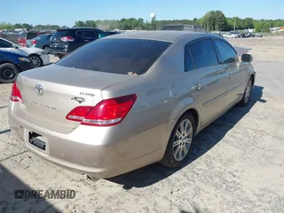2007 Toyota Avalon XL with VIN 4T1BK36B57U241189, listed as a IAAI auction lot 42130640 with 144,735 mi miles. Bid and sale history available at carsss.com. Image 4.