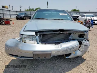 2004 Ford Crown Victoria LX z VIN 2FAFP74W54X184815, wystawiony jako Copart lot #57280725 z przebiegiem 294 513 mil mil oraz Szkoda całkowita • Salvage title. Historia ofert i sprzedaży dostępna na DreamBid. Obrazek 5.