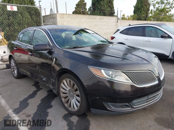 2013 Lincoln MKS with VIN 1LNHL9DK6DG608673, listed as a IAAI auction lot 42756289 with 103,118 mi miles and . Bid and sale history available at DreamBid. Image 1.
