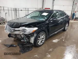 2013 Hyundai Azera z VIN KMHFG4JG4DA218608, wystawiony jako IAAI lot #41601792 z przebiegiem 101 846 mil mil oraz . Historia ofert i sprzedaży dostępna na DreamBid. Obrazek 2.