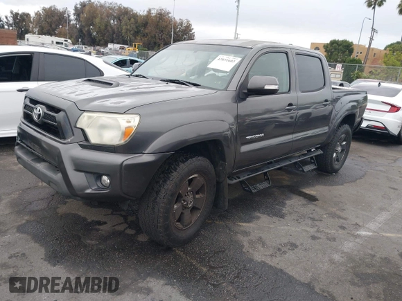 2014 Toyota Tacoma PreRunner with VIN 3TMJU4GN5EM167783, listed as a IAAI auction lot 42031603 with 179,574 mi miles and . Bid and sale history available at DreamBid. Image 2.