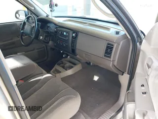 2003 Dodge Dakota SLT with VIN 1D7HG48N03S344321, listed as a IAAI auction lot 42074421 with 96,489 mi miles and . Bid and sale history available at carsss.com. Image 5.