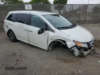 2014 Honda Odyssey Touring z VIN 5FNRL5H91EB089813, wystawiony jako Copart lot #58674275 z przebiegiem Nie podano mil oraz Szkoda całkowita • Salvage title. Historia ofert i sprzedaży dostępna na DreamBid. Obrazek 4.